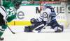 LM Otero / The Associated Press
Dallas’s Brett Ritchie opened the scoring Tuesday in Dallas with a shot past Jets goalie Michael Hutchinson in the first period.