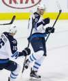 LM Otero / The Associated Press files
Winnipeg Jets right-winger Joel Armia celebrates scoring his first goal of the NHL season Tuesday against the Dallas Stars in Texas.