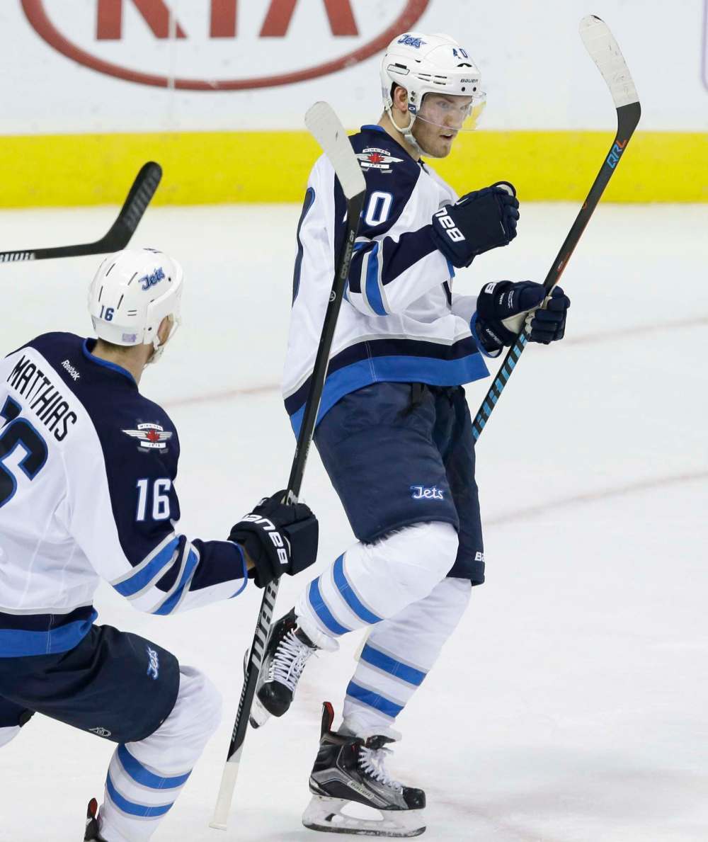 LM Otero / The Associated Press files
Winnipeg Jets right-winger Joel Armia celebrates scoring his first goal of the NHL season Tuesday against the Dallas Stars in Texas.