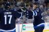 John Woods / The Canadian Press
Winnipeg Jets' Adam Lowry (17) and Patrik Laine (29) celebrate Laine's goal against the Dallas Stars during second period NHL action in Winnipeg on Thursday, October 27, 2016.