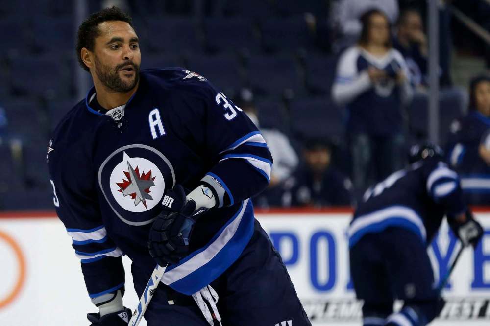 John Woods / The Canadian Press
The Winnipeg Jets’ Dustin Byfuglien has played 30 minutes some nights. Against the Dallas Stars Thursday he was restricted to a mere 24 minutes after he crashed into the boards in the third period.