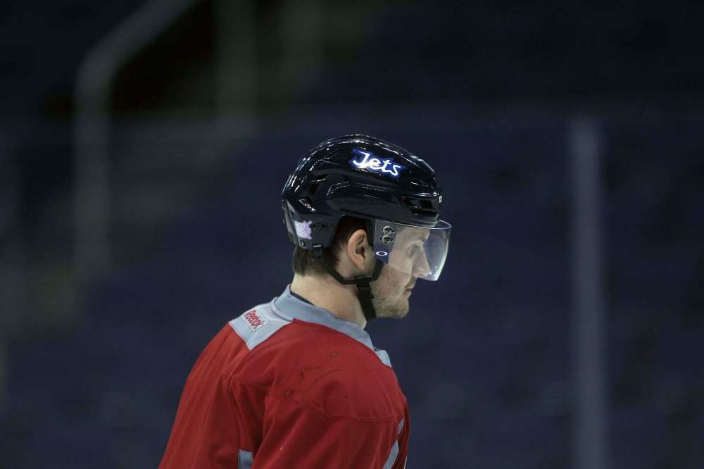 JOE BRYKSA / WINNIPEG FREE PRESSWinnipeg Jets Jacob Trouba, right, returns to the ice at MTS Centre after missing 13 games with a contract dispute. The Jets signed him to a 2 year $ 6 million dollar bridge deal –-Nov 08, 2016 -( See story)