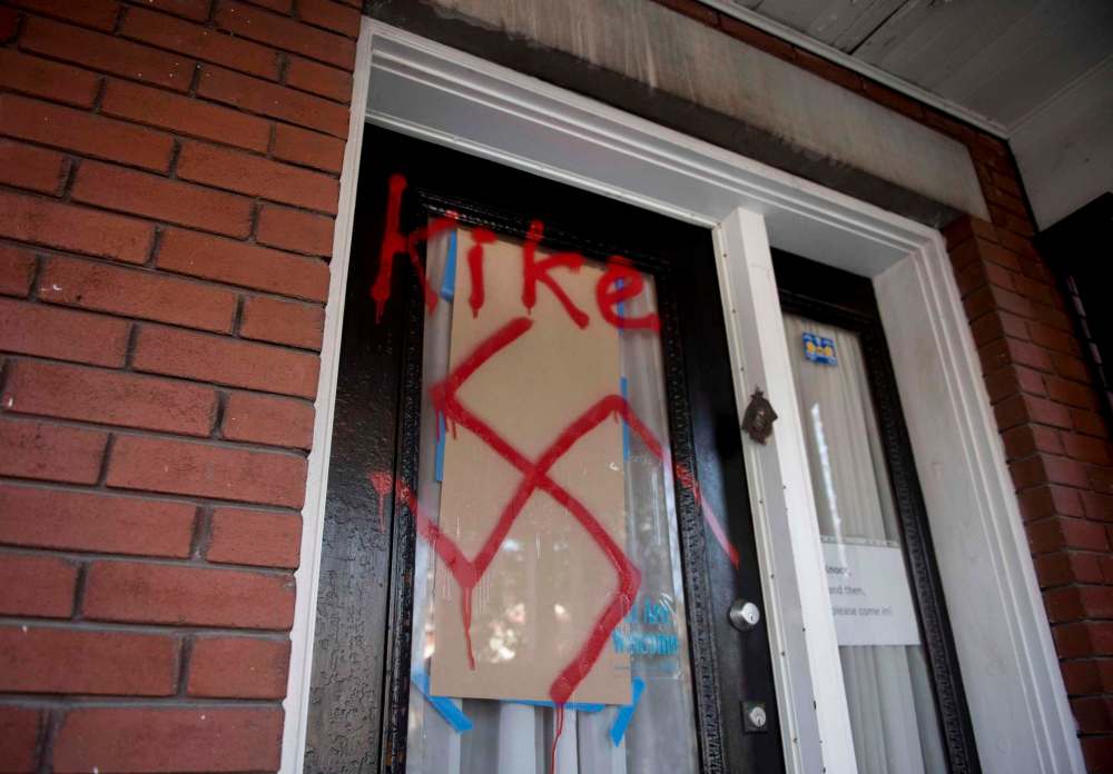 JUSTIN TANG / THE CANaDIAN PRESS FILES
Anti-Semitic graffiti was spray-painted on the door of The Glebe Minyan and home of Rabbi Anna Maranta in Ottawa.
