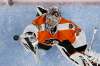 Matt Slocum / The Associated Press
Philadelphia Flyers' Steve Mason reaches for a loose puck during the first period of an NHL hockey game against the Ottawa Senators, Tuesday, Nov. 15, 2016, in Philadelphia. Ottawa won 3-2 in a shootout.