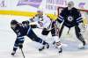 John Woods / The Canadian Press
Chicago Blackhawks' Jonathan Toews clears Winnipeg Jets' Toby Enstrom as he attempts to screen Jets' goaltender Connor Hellebuyck Tuesday at the MTS Centre.