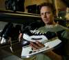 WAYNE GLOWACKI / FREE PRESS FILES
Scott Van Horne holds a custom-made skate worn by Winnipeg Jets player Dustin Byfuglien. VH was recently sold to Memphis-based sporting goods manufacturer True Temper.