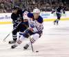 PHIL HOSSACK / WINNIPEG FREE PRESS
Winnipeg Jets captain Blake Wheeler trails Edmonton Oilers captain Connor McDavid Thursday at the MTS Centre.