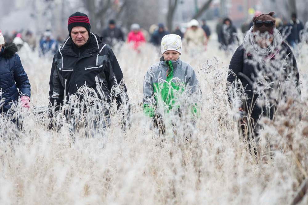 MIKE DEAL / WINNIPEG FREE PRESS Hundreds of volunteers showed up to help in the ground search for College Beliveau teacher Kevin Dilk who went missing last Wednesday. The search started in two locations along the train tracks at Thibault Street and the brush behind the Robins Coffee shop at Provencher Blvd and Des Meurons Street along the Seine River. 161127 - Sunday November 27, 2016