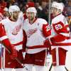 KATHY WILLENS / ASSOCIATED PRESS FILES
Frans Nielsen, left, Mike Green (25) and Danny DeKeyser (65) celebrate after Green had a goal during the third period against the Islanders Sunday. Green's goal was disallowed after a coach's challenge.