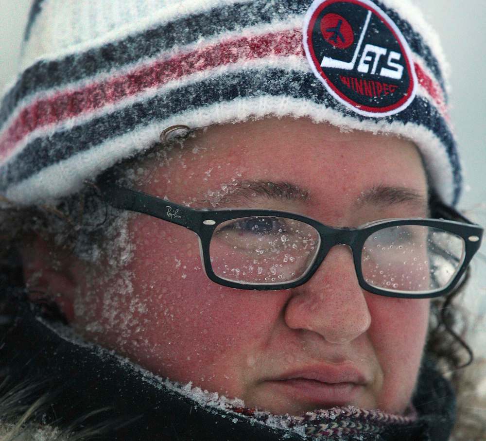 JOE BRYKSA / WINNIPEG FREE PRESS
Rayna Tolchinsky braves the snow in River Heights in Winnipeg during the winter storm Tuesday morning.