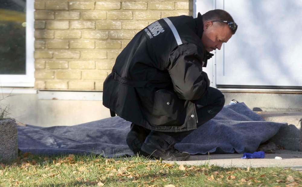 JOE BRYKSA / WINNIPEG FREE PRESS
Winnipeg Police investigate the area of King Street and Stella Walk the day Nicholas Cook was found dead there after a party the night before.