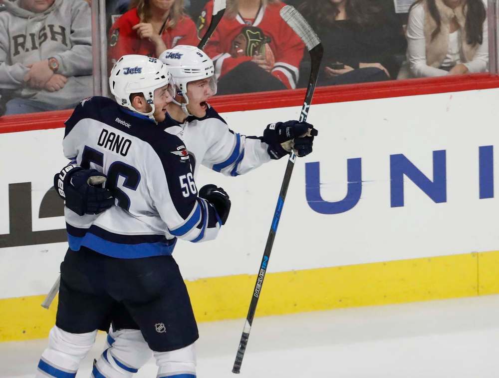 Kamil Krzaczynski / the associated press
Moose call-up forwards Marko Dano and Andrew Copp have been sterling for the Jets so far this season.