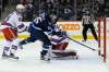 THE CANADIAN PRESS/JOHN WOODS
Winnipeg Jets' Mark Scheifele scores on New York Rangers goaltender Antti Raanta during THE second period on Thursday.