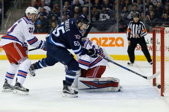 THE CANADIAN PRESS/JOHN WOODSWinnipeg Jets' Mark Scheifele scores on New York Rangers goaltender Antti Raanta during THE second period on Thursday.