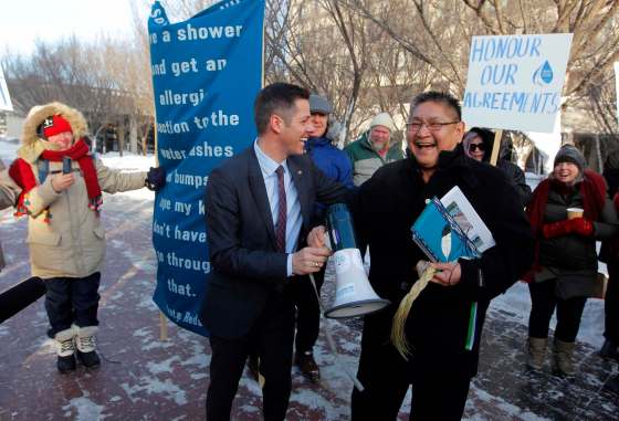 BORIS MINKEVICH / WINNIPEG FREE PRESSWinnipeg Mayor Brian Bowman and Chief Erwin Redsky outside City Hall where Freedom Road supporters gathered Monday morning.