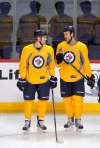 BORIS MINKEVICH / WINNIPEG FREE PRESS
Joel Armia (left) and Shawn Matthias wear yellow non-contact jerseys during practice.