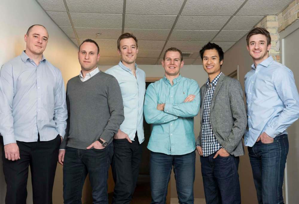 DAVID LIPNOWSKI / WINNIPEG FREE PRESS
U.K. company Just Eat gobbled up Winnipeg’s SkipTheDishes Thursday. From left is Dan Simair of SkipTheDishes, Howard Migdal from Just Eat and Josh Simair, Jeff Adamson, Andrew Chau and Chris Simair of SkipTheDishes.