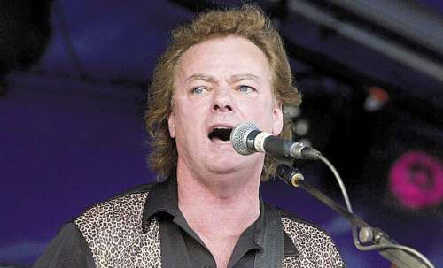 CLIFFORD SKARSTEDT / CANADIAN PRESS FILES
Myles Goodwyn of April Wine performs at Kawartha Racetrack Slots in Peterborough, Ont., in 2001.