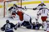 TREVOR HAGAN / WINNIPEG FREE PRESS
Blue Jackets' Jack Johnson flattens the Jets' Mark Scheifele (55) in front of goaltender Sergei Bobrovsky, Thursday at MTS Centre.