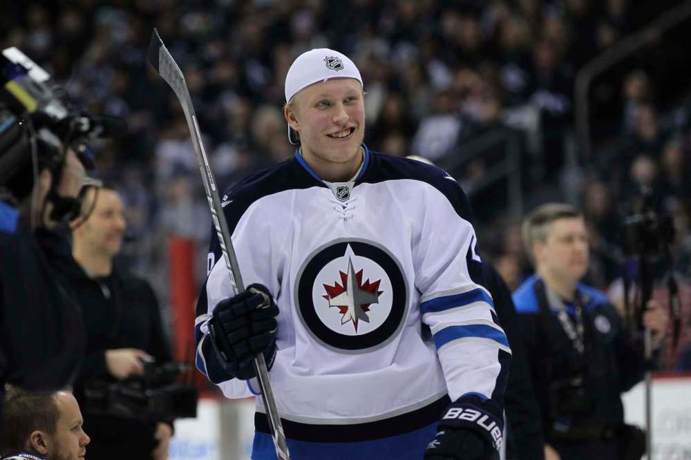 RUTH BONNEVILLE / WINNIPEG FREE PRESS
Patrik Laine is all smiles after winning the accuracy test event with a time of 8.4 seconds at the annual Winnipeg Jets Skills Competition at MTS Centre Friday night.