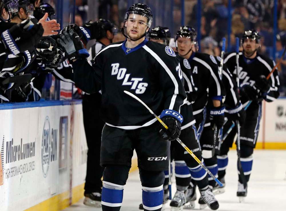 Tampa Bay Lightning's Jonathan Drouin celebrates a goal during the first period of the team's NHL hockey game against the Carolina Hurricanes on Saturday, Dec. 31, 2016, in Tampa, Fla. The Lightning won 3-1. (AP Photo/Mike Carlson)