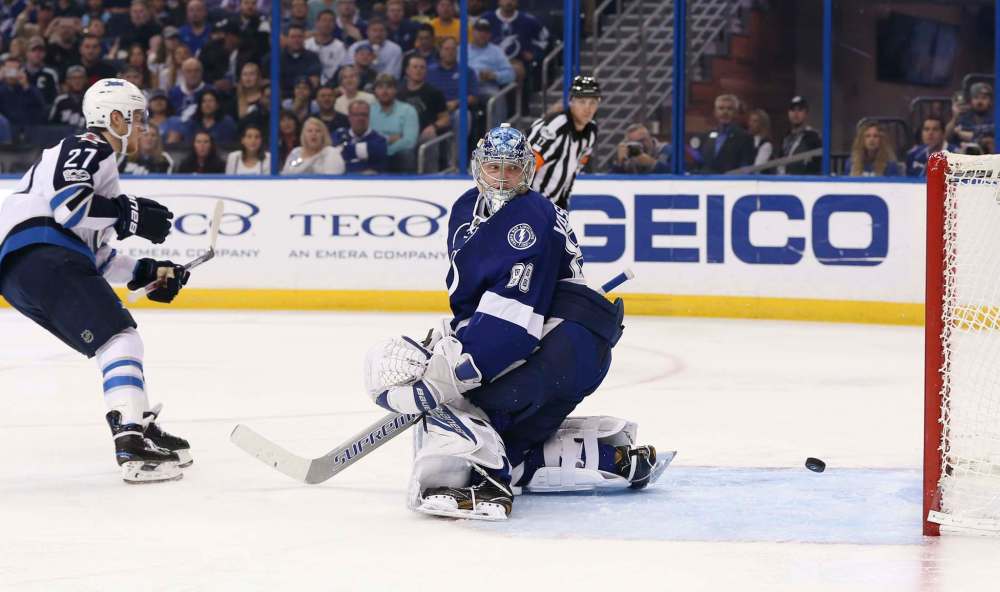 Dirk Shadd / Tampa Bay Times
Nikolaj Ehlers beats Tampa Bay Lightning goalie Andrei Vasilevskiy on a penalty shot in the second periord.