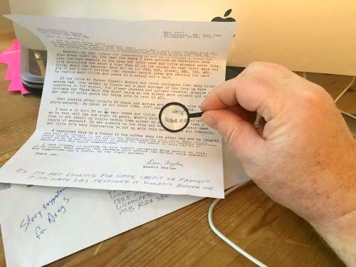 Doug uses the world&rsquo;s smallest magnifying glass to study a letter from a concerned reader.