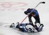 JEFFREY T. BARNES / AP
Winnipeg Jets forward Patrik Laine (29) is helped by a trainer after being hit during the third period of an NHL hockey game against the Buffalo Sabres, Saturday.