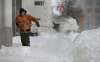 WAYNE GLOWACKI / WINNIPEG FREE PRESS
Gilles Laramee clears the sidewalk in front of the Colony Commons on Colony St. during the Boxing Day snow storm.