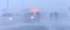 WAYNE GLOWACKI / WINNIPEG FREE PRESS
Firefighters at the scene of a 12-car pileup at McPhillips St. and the Perimeter in white-out conditions.