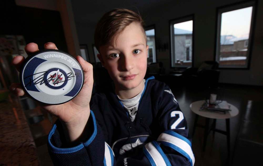 PHIL HOSSACK / WINNIPEG FREE PRESS
Lucas Bydak had Patrik Laine drop by his home Thursday evening as a belated birthday surprise.