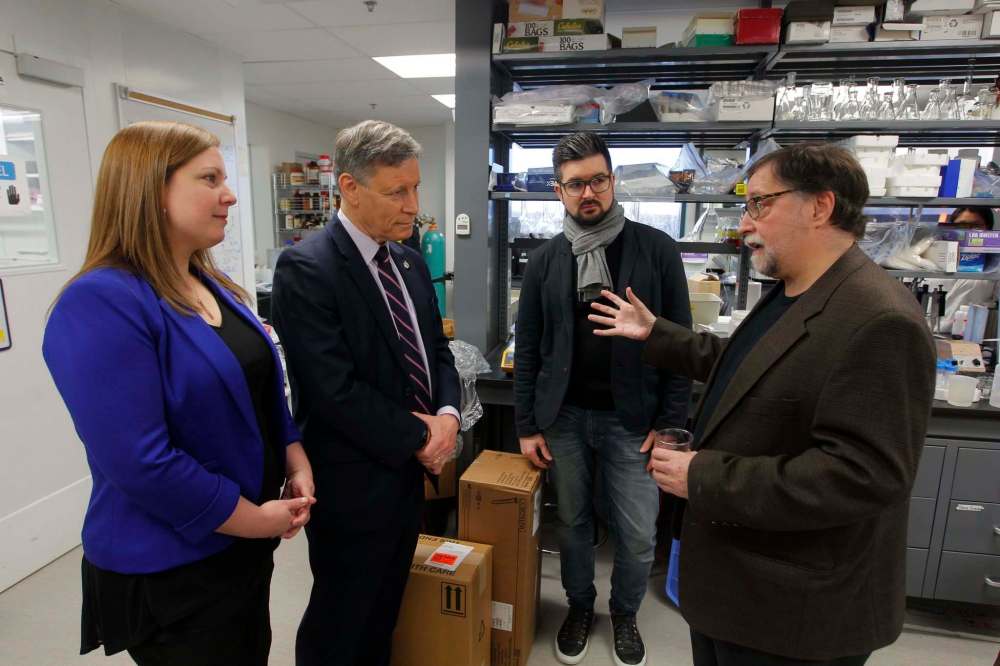 BORIS MINKEVICH / WINNIPEG FREE PRESS
Seen in the lab: Sarah Guillemard, MLA for Fort Richmond (left to right), Terry Duguid, MP for Winnipeg South, Dr. Casey Hubert, associate professor in the University of Calgary's Department of Biological Sciences, and Dr. Gary Stern, research professor at the Centre for Earth Observation Sciences at the University of Manitoba.
