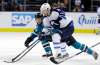 Winnipeg Jets' Bryan Little, right, works against San Jose Sharks' Melker Karlsson during the third period of an NHL hockey game, Monday, Jan. 16, 2017, in San Jose, Calif. (AP Photo/Marcio Jose Sanchez)
