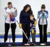 The late Vic Peters' son and daughters Daley Peters, Kasandra Leafloor, her son Jacob (7) and Liz Fyfe at the Fort Garry Curling Club Thursday. Vic&rsquo;s grandson Jacob threw out the opening rock.