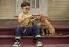 Bailey the dog is reincarnated into various pooches during A Dog’s Purpose. Bailey plays with young Ethan (Bryce Gheisar) during the 1950s.