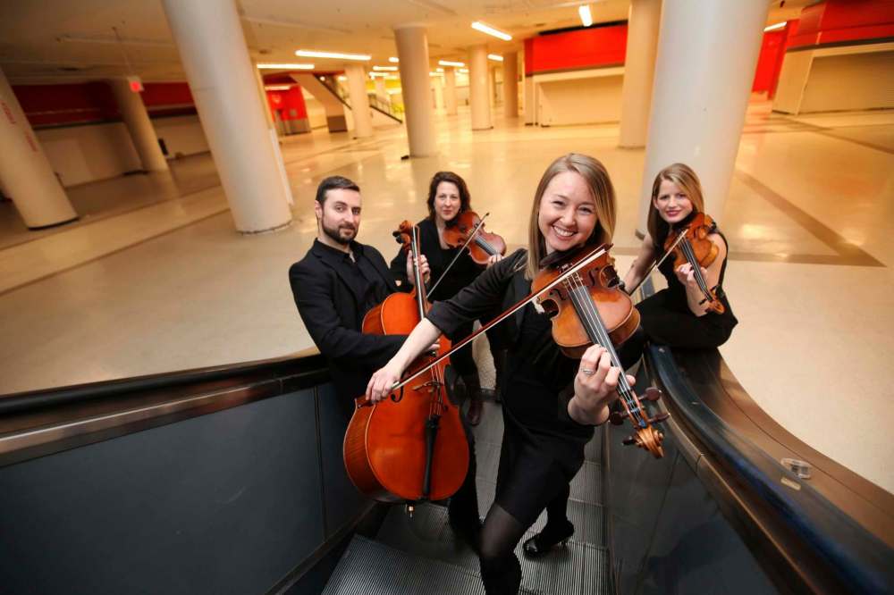 RUTH BONNEVILLE / WINNIPEG FREE PRESS
The Winnipeg New Music Festival String Quartet, from left: cellist Sean Taubner, violist Elise Lavallée, and violinists Kristina Bauch and Meredith McCallum. The group will be part of the program Thursday night at the Bay downtown.