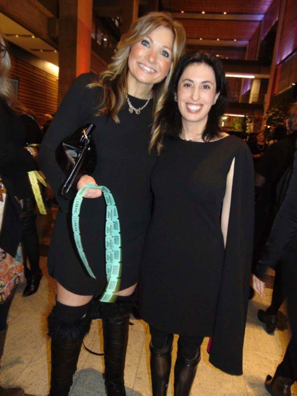 MAUREEN SCURFIELD / WINNIPEG FREE PRESS
Raquel Godin (left) and Carolyn Lindner in their groovy boots attend the Society of Manitobans with Disabilities Passion For Fashion fundraiser Feb. 6.
