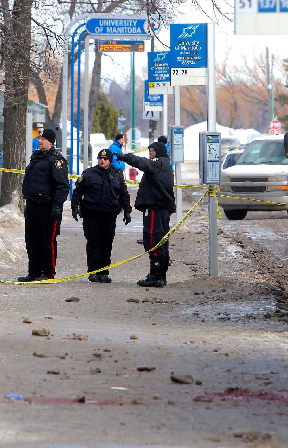 BORIS MINKEVICH / WINNIPEG FREE PRESS
Police at the scene of the homicide on campus Tuesday.