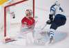 GRAHAM HUGHES / THE CANADIAN PRESS
Joel Armia scores on Carey Price during the second period.