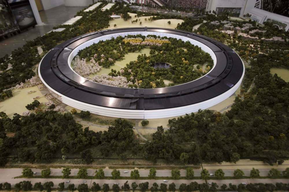 Dai Sugano / Bay Area News Group files
The main building of the upcoming Apple Park has a UFO-like ring shape, will cover 2.8 million square feet and will be entirely clas int he world's largets panels of curved glass.