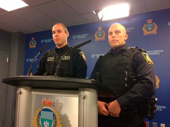 BORIS MINKEVICH / WINNIPEG FREE PRESSConstables Ashley Thompson and Trevor Bragnalo rescued six people from a burning house over the weekend.