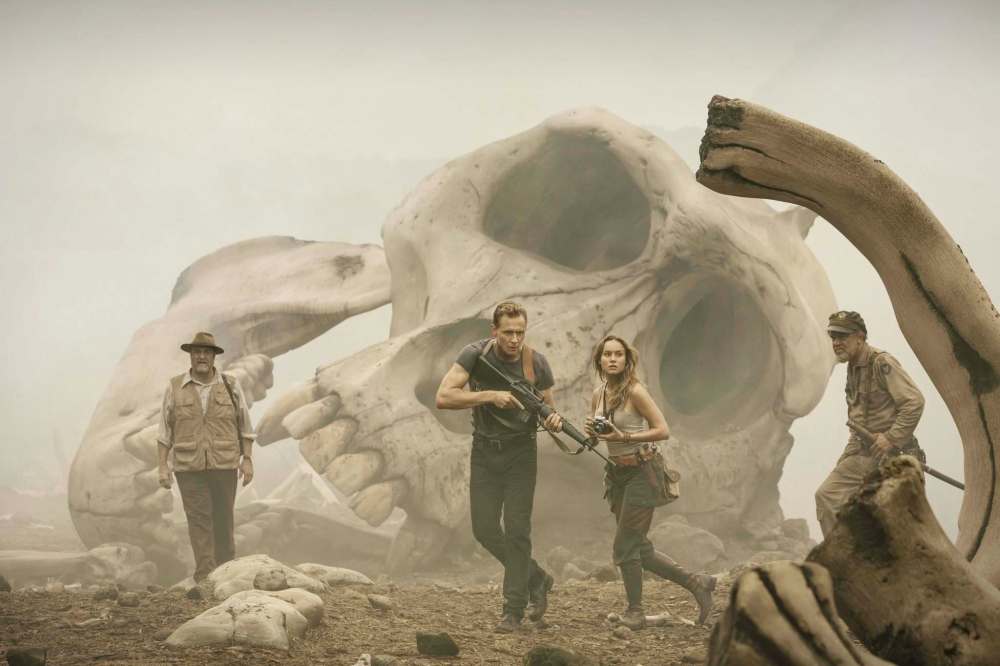 CHUCK ZLOTNICK / WARNER BROS.
John Goodman (from left), Tom Hiddleston, Brie Larson and John C. Reilly in a scene from Kong: Skull Island.