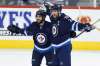John Woods / The Canadian Press
Winnipeg Jets' Blake Wheeler (right) and Mathieu Perreault celebrate Wheeler's power-play goal against St. Louis Friday.