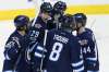 JOHN WOODS / THE CANADIAN PRESS
Mathieu Perreault, Patrik Laine and Mark Scheifele celebrate Laine's goal against the Colorado Avalanche during the first period at the MTS Centre Saturday.