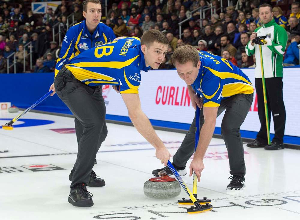 Andrew Vaughan / The Canadian Press
Karrick Martin (right) is competing at his first Brier. His dad Kevin Martin won the tournament four times.