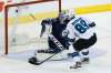 JOHN WOODS / WINNIPEG FREE PRESS
San Jose Sharks Mikkel Boedker scores on Winnipeg Jets goaltender Connor Hellebuyck Monday at the MTS Centre.