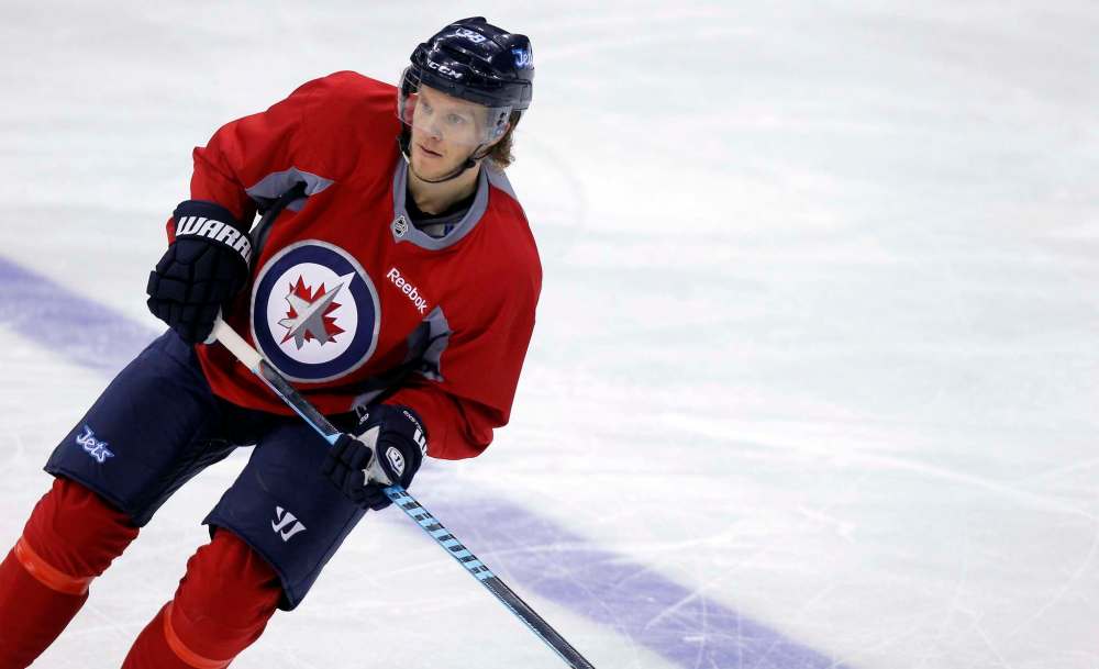 BORIS MINKEVICH / FREE PRESS FILES
Toby Enstrom's year is officially over.
.
