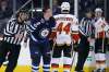 John Woods / THE CANADIAN PRESS
Winnipeg Jets Jacob Trouba bleeds from a cut he suffered in a fight with Calgary Flames Sam Bennett at the MTS Centre Saturday.