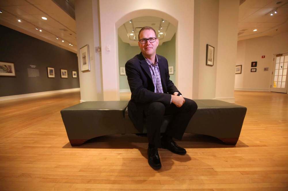 RUTH BONNEVILLE / WINNIPEG FREE PRESS
Trevor Clearwater takes a load off in the John P. Crabb Gallery.