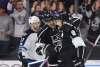 (AP Photo/Mark J. Terrill)
Los Angeles Kings defenseman Drew Doughty, right, is congratulated by center Anze Kopitar, center, of Slovenia, after scoring as Winnipeg Jets center Adam Lowry skates past during the third period of an NHL hockey game, Thursday, March 23, 2017, in Los Angeles. The Kings won 5-2.